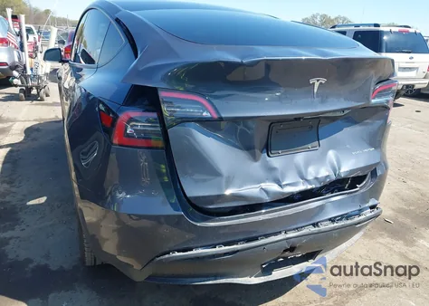 2023 Tesla Model Y из США, поврежденный, VIN 7SAYGDEE5PF834774
